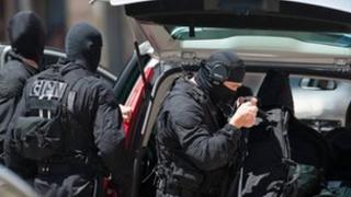 Elite police officers arrive at the Toulouse bank