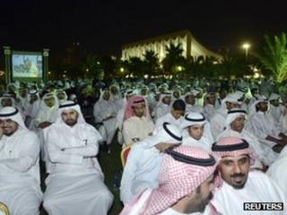 Kuwaiti men attend a protest in Kuwait City's Erada square (26 June 2012)