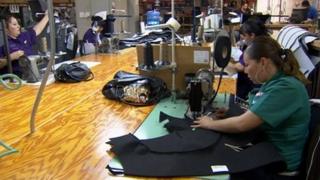 Women on sewing machines in factory in Ciudad Juarez