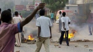This Friday, June 22, 2012 citizen journalism photo provided by the group Grifina, purports to show tires burning during a protest in Khartoum, Sudan