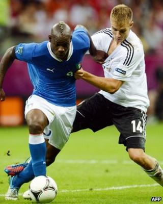 Italy's Balotelli and Germany's Badstuber in Euro 2012 semi-final