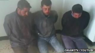 Still from a video uploaded to YouTube allegedly showing men confessing to attacking protesters