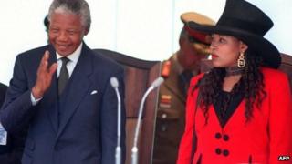 Nelson Mandela waving at the crowd during his inauguration as president at the Union Building in Pretoria next to his eldest daughter Zenani Mandela-Dlamini on 10 May 1994