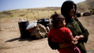 Palestinian woman and her daughter in Al Malih, in the northern Jordan Valley