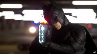 Christian Bale portrays Batman in a scene from The Dark Knight Rises