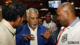 East Timor Prime Minister Xanana Gusmao (C) party officials after a news conference in Dili. 15 July
