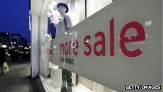 Shop window with sale sign