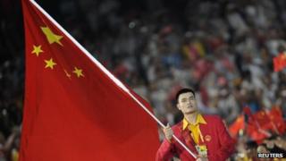 File photo of Yao Ming carrying the Chinese national flag during the opening ceremony of the Beijing 2008 Olympic Games