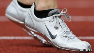 An athelete wears a pair of Nike shoes