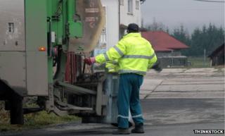Bin man collecting bins