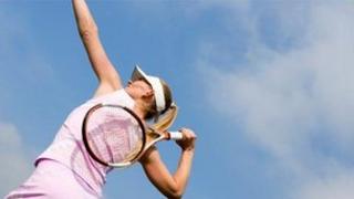 Woman playing tennis