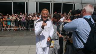 Sir Bruce Forsyth pulls a pose for BBC 2012