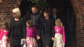 Families of Steve Barber and John Taylor leaving a memorial service at Nether Poppleton near York