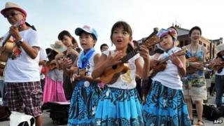Ukulele players perform in Yokohama to set a new Guinness World Record