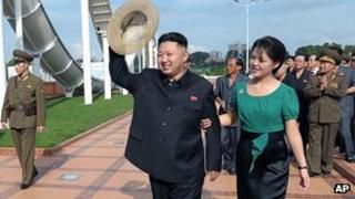 Kim Jong-un with his wife, Ri Sol Ju, in Pyongyang. 25 July 2012