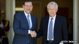 Spanish Prime Minister Mariano Rajoy with Italian counterpart Mario Monti