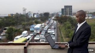 An IBM employee, gathering data on traffic congestion in Nairobi, Kenya