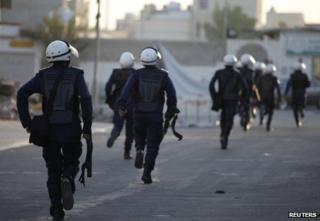 Bahraini riot police deploy in Sitra, south of Manama, 17 August