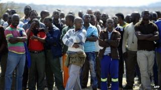 Striking platinum miners gather on 20 August 2012 at Lonmin's Marikana platinum mine