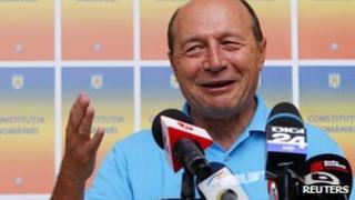 President Basescu addresses the media in Bucharest (File)