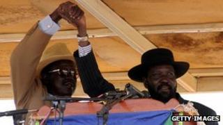 Paulino Matip (L) and Salva Kiir (January 2006)