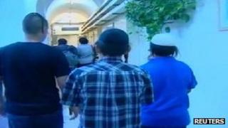 Two of the children are escorted to a courtroom in Jerusalem (26 August 2012)