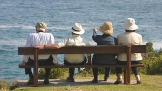 Elderly people on a bench