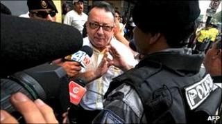 Columnist Emilio Palacio outside the court