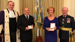 medals presented guernsey empire british residents ceremony caption government special were house