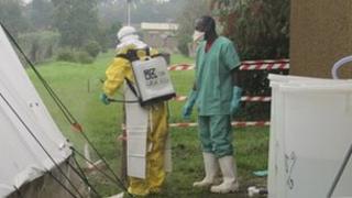 Staff members work inside the hospital of Kigadi town in the Ugandan Western district of Kibaale, the epicenter of the Ebola outbreak, in Uganda in this handout photo released by Medicins Sans Frontieres (MSF) to Reuters August 2, 2012
