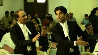 Court scene with actor Raj Kumar Yadav playing Shahid Azmi (r)