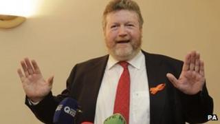 Health Minister James Reilly was criticised for introducing a separate cut of 130m euros