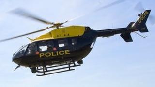 helicopter robber armed hunted scratch garage card involved hunt force been caption bbc