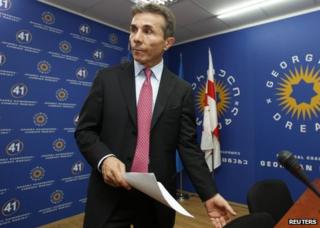 Georgian opposition leader Bidzina Ivanishvili meets foreign diplomats in his office in Tbilisi, 30 August 2012