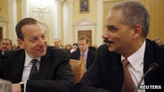 Attorney General Eric Holder chats with Assistant Attorney General Lanny Breuer