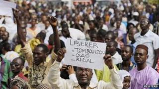 People from northern Mali march against the seizure or their home region by Tuareg and Islamist rebels, in the capital Bamako, 10 April 2012
