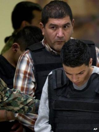 Ivan Velazquez Caballero is paraded before the cameras. 27 Sept 2012