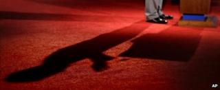 Shadow cast from the debate podium