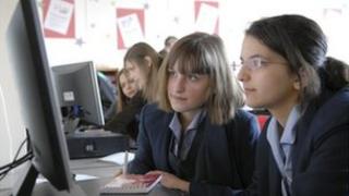 Schoolgirls with computer