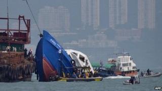 The Lamma IV pleasure boat, which partially sank off Hong Kong's Lamma island on Monday night, is recovered on Tuesday