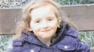 April Jones in the purple coat she was believed to be wearing