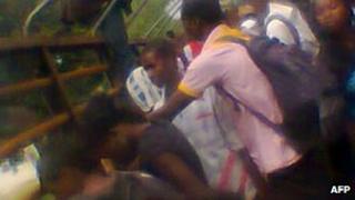 Students in Mubi, Nigeria, gathering at the morgue on 2 October 2012