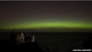 Aurora over Dunluce Castle