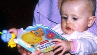 baby with book