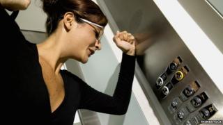 Woman trapped in lift