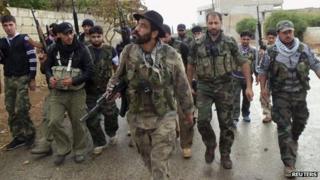 Free Syrian Army fighters in Binsh near Idlib (image filed 25 October 2012)