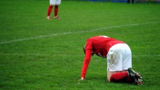 Forest player on the ground