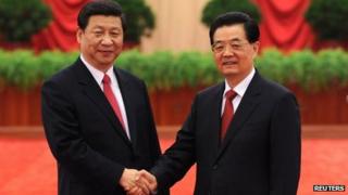 Xi Jinping (L), newly-elected general secretary of the Central Committee of the Communist Party of China, and Chinese President Hu Jintao, 16 November 2012