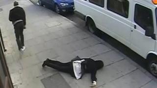 CCTV still of the girl on the floor after the attack