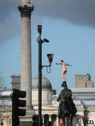 Naked man on statue